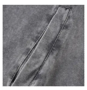 Close-up macro view of vintage gray acid-washed heavy cotton sweatshirt fabric texture