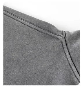 Detailed close-up of premium double stitching on a 450G washed heavy cotton hoodie
