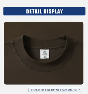 Close-up detail of heavy weight cotton brown T-shirt neckline with YMCP brand label