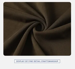 Close-up macro detail of 350g heavyweight pure cotton fabric texture in coffee brown
