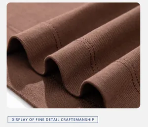 Close-up detail of brown heavy cotton T-shirt showing fine stitching and fabric texture