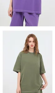 Close-up view of a heavy cotton vintage washed t-shirt set in purple and olive green colors