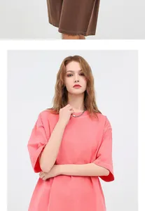 Detailed macro view of vintage washed coral pink heavyweight cotton t-shirt texture