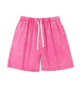 Front view detail of vintage acid washed pink heavy cotton shorts for men summer casual