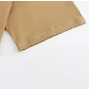 Close-up of double-stitched sleeve cuff on heavy cotton khaki T-shirt