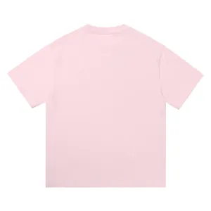 Back view of a premium 330g heavyweight cotton pink t-shirt in a loose street style fit