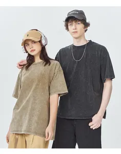 Male and female models wearing oversized heavy cotton acid-washed retro t-shirts