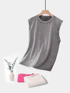 Detailed view of heavy-duty 230G washed cotton vests in grey, pink, and beige colors