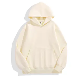 Minimalist cream oversized drop-shoulder hoodie featuring a front kangaroo pocket and hood