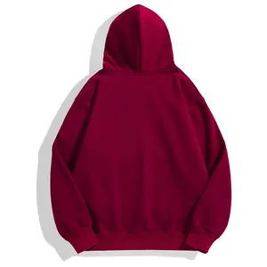 Close-up view of the back of a thick burgundy oversized drop shoulder fleece hoodie
