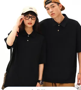 Detailed look at the heavyweight black cotton Polo shirt on male and female models.