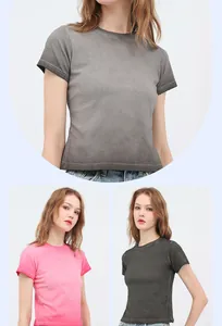 Detail view of washed distressed cotton crop top T-shirt showing texture and color variants