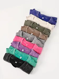 Close-up detail of heavyweight washed cotton T-shirts in diverse vintage colors