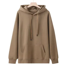 Detail view of a plain brown oversized hoodie made of heavy 320g cotton on a hanger