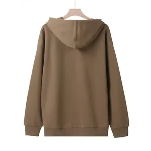 Detailed back view of a men's oversized brown hoodie with high-quality fabric texture