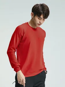 T-shirt de sport rouge à manches longues pour homme, séchage rapide, col rond.