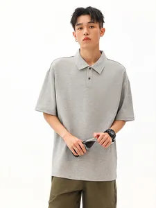 Heavyweight grey cotton short-sleeved Polo shirt in a relaxed streetwear fit for men and women.