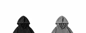 Detail view of oversized washed distressed hoodies in black and dark grey options