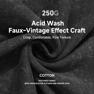 Close-up macro view of heavyweight 250g acid-washed cotton fabric for vintage T-shirts