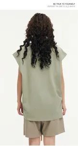 Back view of a sage green oversized sleeveless t-shirt in heavy 270G cotton fabric