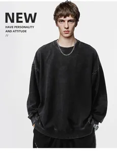 Detailed view of a 360G heavyweight washed vintage oversized crewneck sweatshirt for men