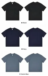 Macro view of plain cotton drop shoulder T-shirt in black navy and denim blue