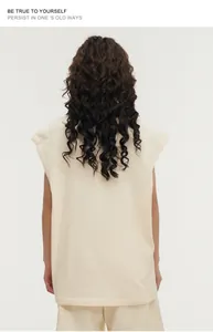 Detailed back view of a cream oversized sleeveless tank top showing relaxed street style