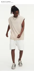 Detail of an oversized street style beige sleeveless tank top for men and women