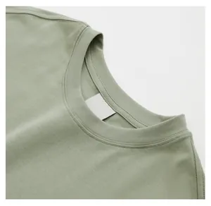 Close-up detail of the ribbed neckline on a sage green heavyweight cotton tank top