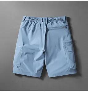 Back view detail of light blue quick-dry cargo shorts with elastic waist