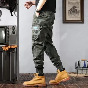 Vintage camouflage cargo pants with multi-pockets and jogger cuffs for men and women