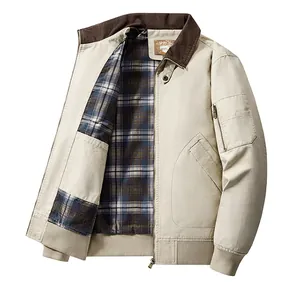 Detail of men's washed cotton flight jacket with plaid lining and corduroy collar
