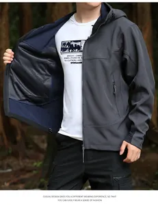 Détail d'une veste softshell pour homme montrant la doublure en maille bleue et le tissu.