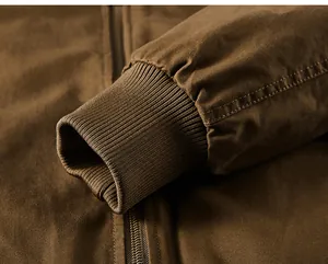 Detailed close-up of the durable ribbed cuff and washed cotton fabric on men's bomber jacket