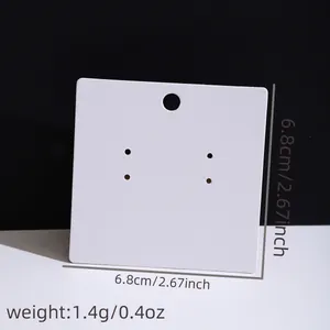 Detailed view of a white square earring display card with dimensions 6.8 x 6.8 cm