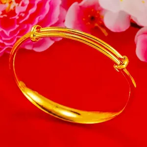 Elegante brazalete ajustable de color dorado con diseño clásico push-pull para mujer
