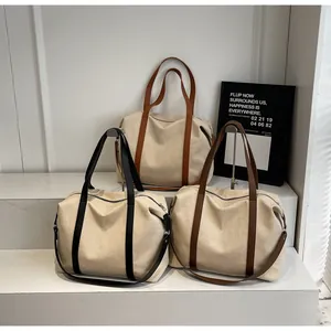 Stylish large capacity canvas tote bags for women with black and brown leather straps
