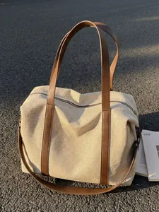 Large capacity retro canvas tote bag for women ideal for travel and daily commute
