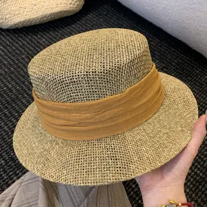 French flat top straw hat with orange fabric band for summer beach sun protection