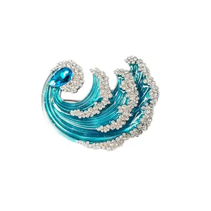 Elegante spilla a forma di onda con smalto blu e strass di cristallo scintillanti per donna