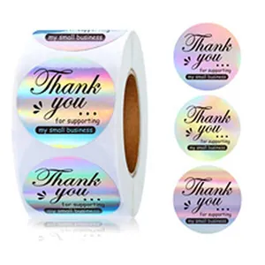 Nahaufnahme holografischer 'Thank you'-Aufkleber für kleine Unternehmen auf Rolle