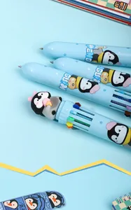 Gros plan sur les stylos bille 10 couleurs pingouin pour les agendas et le dessin scolaire.