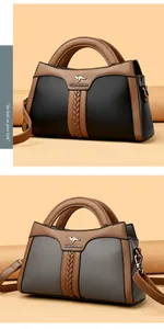Detailansicht zweier eleganter Lederhandtaschen mit Känguru-Logo und Webakzenten