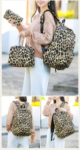 Modelo con set de 3 piezas de leopardo con mochila, bolsa de almuerzo y estuche