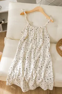 Close-up detail of a sweet white double-layer cotton gauze nightgown with cute rabbit prints.