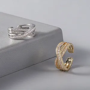 Elegant crisscross copper open rings with pavé cubic zirconia in 18K gold and silver finish