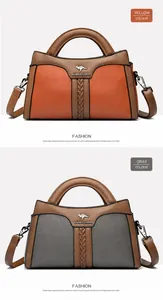 Elegante Damenhandtasche in den Farben Gelb und Grau mit Känguru-Logo und Tragegriff.
