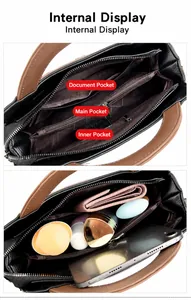 Innenansicht der Handtasche mit Fächern für Ausweise, Zubehör und Dokumente.