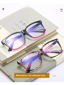 Close-up of stylish square-frame anti-blue light glasses on vintage books