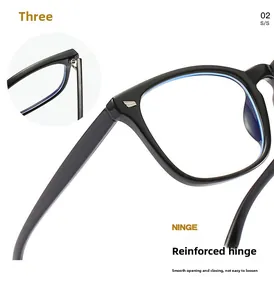 Detail view of the reinforced hinge on black square blue light blocking glasses.